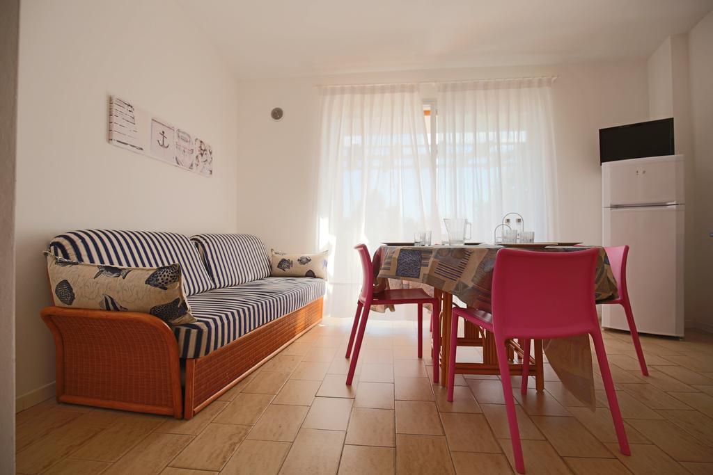 Residence Selenis Caorle Habitación foto